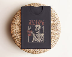 Staying Alive Shirt, Skeleton Coffee T-Shirt, Funny Skeleton T-Shirt, Coffee Lover Gift, Funny Coffee T-Shirt, Skull Coffee Tee