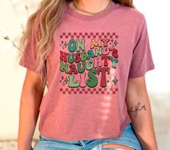 On My Husband's Naughty List Christmas Shirt, Funny Husband Tshirt, Groovy Retro Christmas Shirt, Santa Husband List Shirt, Gift For Husband