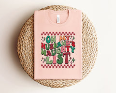 On My Husband's Naughty List Christmas Shirt, Funny Husband Tshirt, Groovy Retro Christmas Shirt, Santa Husband List Shirt, Gift For Husband